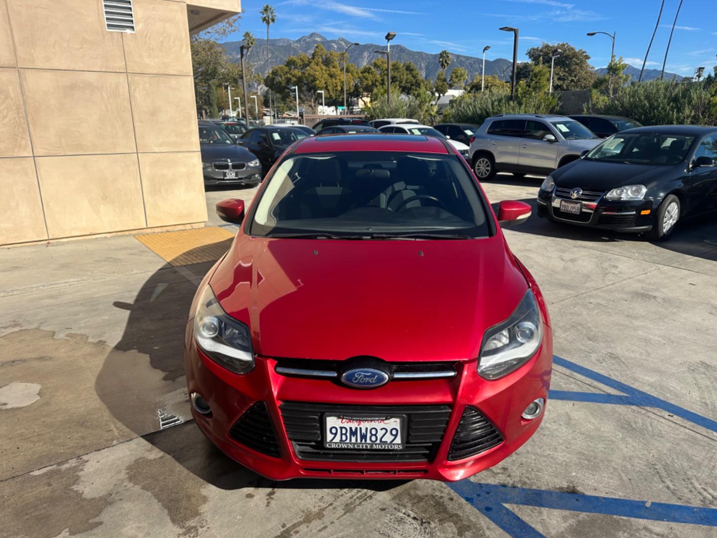 2012 RED /BLACK Ford Focus SE Sedan (1FAHP3F29CL) with an 2.0L L4 DOHC 16V engine, AUTOMATIC transmission, located at 30 S. Berkeley Avenue, Pasadena, CA, 91107, (626) 248-7567, 34.145447, -118.109398 - New Tires! Nice Interior! drives and looks good! Bad credit? We can help! We are the bank. All our cars are thoroughly inspected and reconditioned by our technicians. FREE CARFAX report. Stop by or call to speak with our friendly staff. Whether you have bad credit, no credit, bankruptcy, or reposse - Photo#7